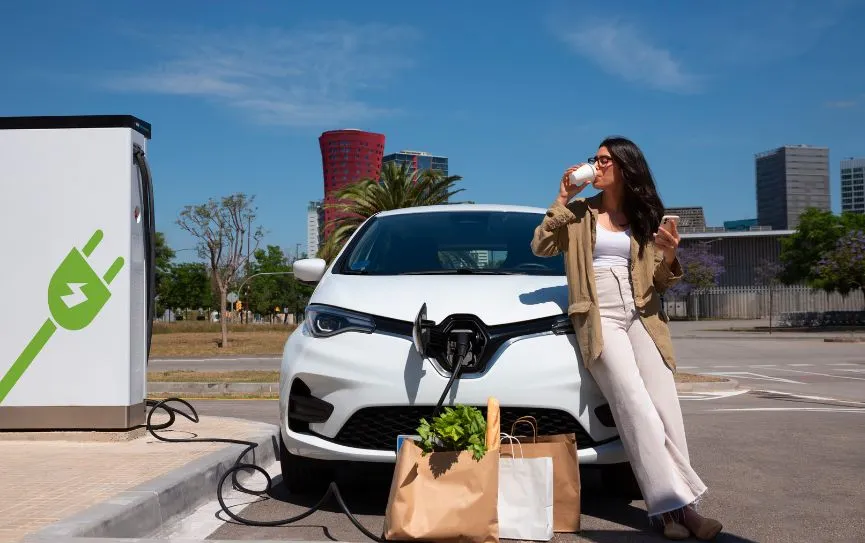 Smart EV charger installed in a modern UAE villa garage with electric car plugged in
